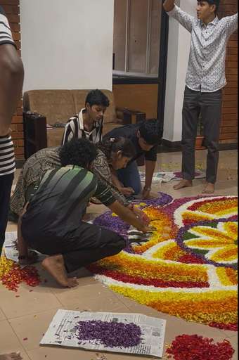 Pookalam / rangoli being made for Onam